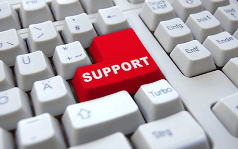 Ausschnitt einer Computertastatur, bei der die Entertaste rot eingefärbt ist und auf welcher das Wort "Support" geschrieben steht